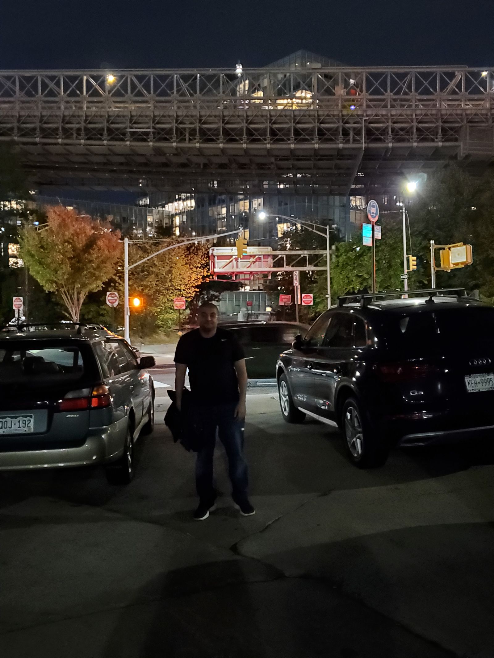 Rimon Mikhael at night beneath the bridge, New York